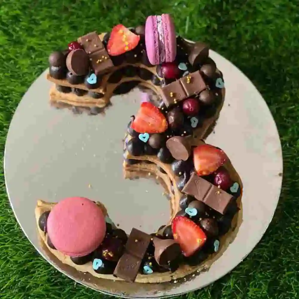 Beautiful monogram number 3 cake design